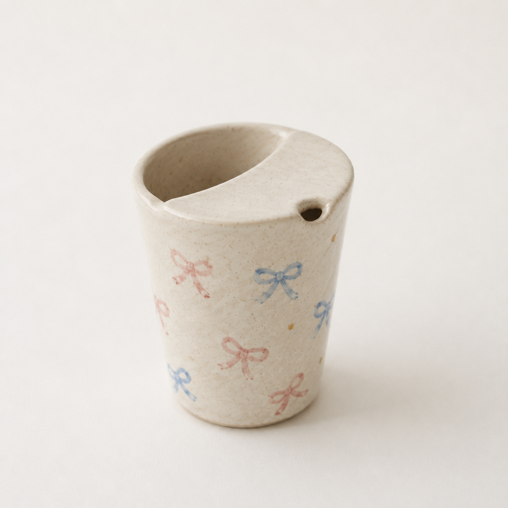 Hand Painted Bow Ceramic Travel Mug, Coquette Pottery Tumbler with Sip Opening, Pink and Blue Ribbon Coffee Cup