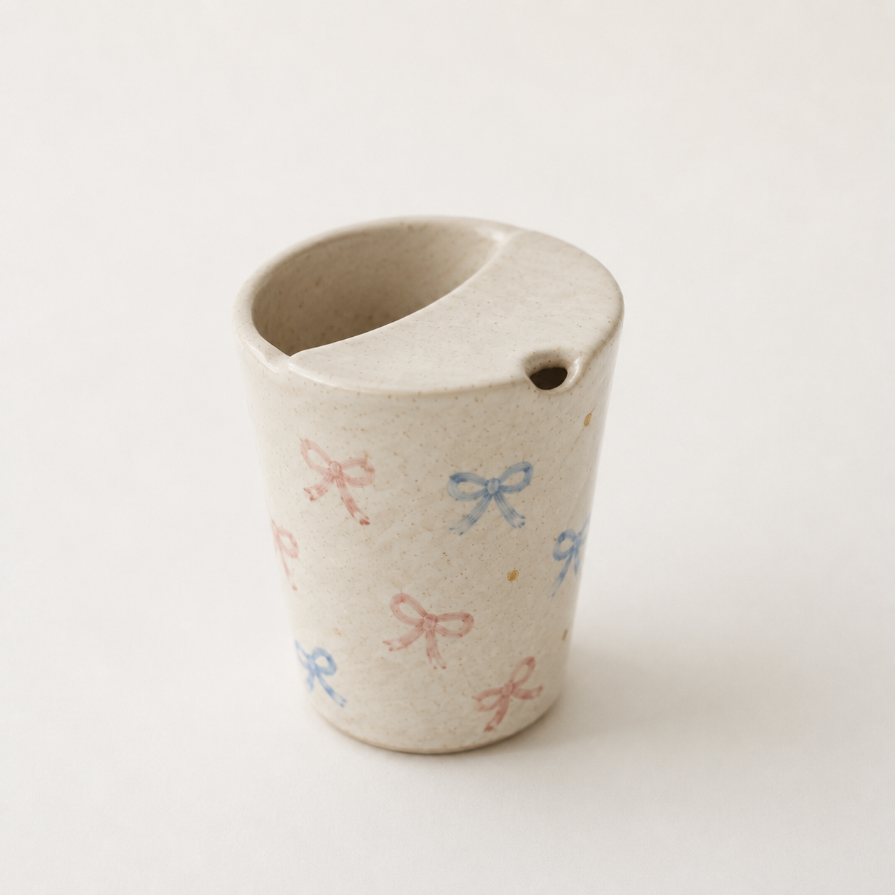 Hand Painted Bow Ceramic Travel Mug, Coquette Pottery Tumbler with Sip Opening, Pink and Blue Ribbon Coffee Cup