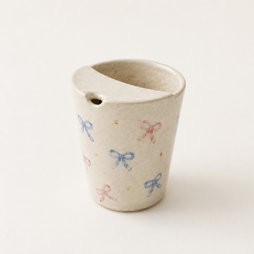 Hand Painted Bow Ceramic Travel Mug, Coquette Pottery Tumbler with Sip Opening, Pink and Blue Ribbon Coffee Cup