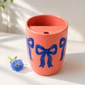 Coral Bow Handmade Ceramic Travel Mug